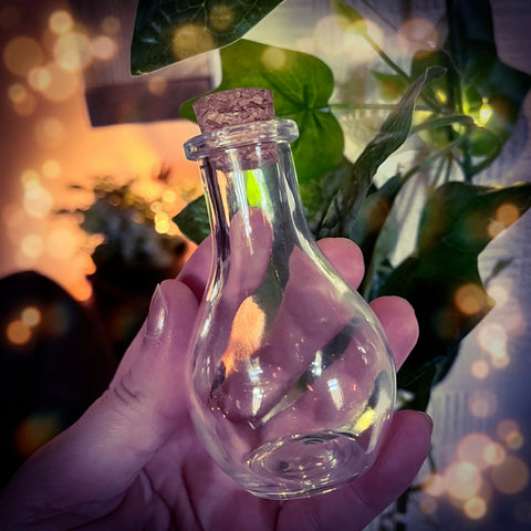 Cork topped glass spell bottle